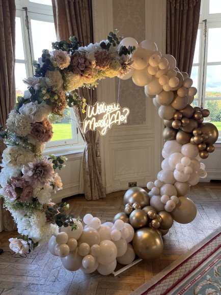 Balloon and floral hoop with neon light