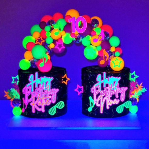 Twin arch neon glow in the UV light disco cake