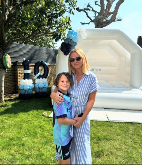 Our bouncy castle with a garland and balloon stack for Kimberly Walsh's son Bobby's 10th birthday