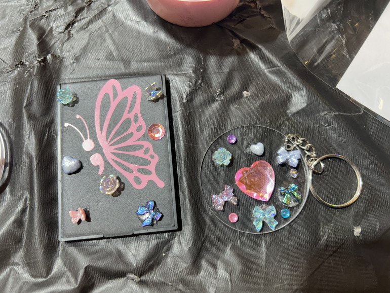 Child’s artwork at my workshop made a butterfly vinyl mirror and diamonte keyring.