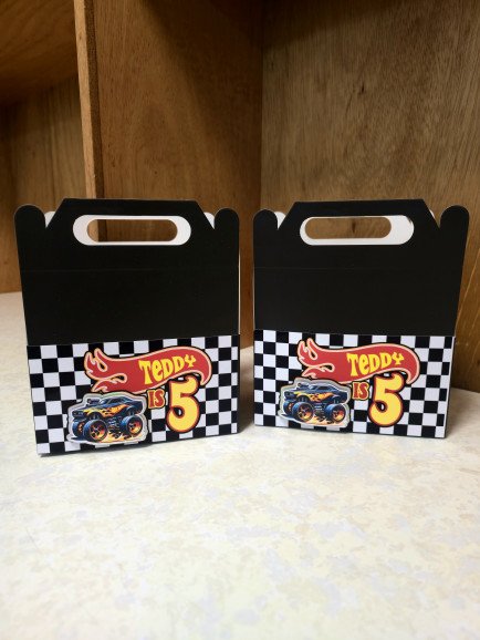 Party favour boxes, available to suit your event theme! Custom colouring books are also available.