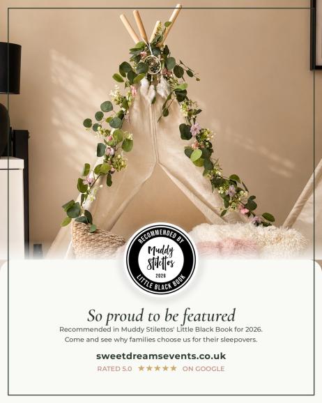 Boho-styled teepee with eucalyptus and floral garland, blush and cream cushions, and a Muddy Stilettos Little Black Book 2026 recommended rosette overlaid on the image.