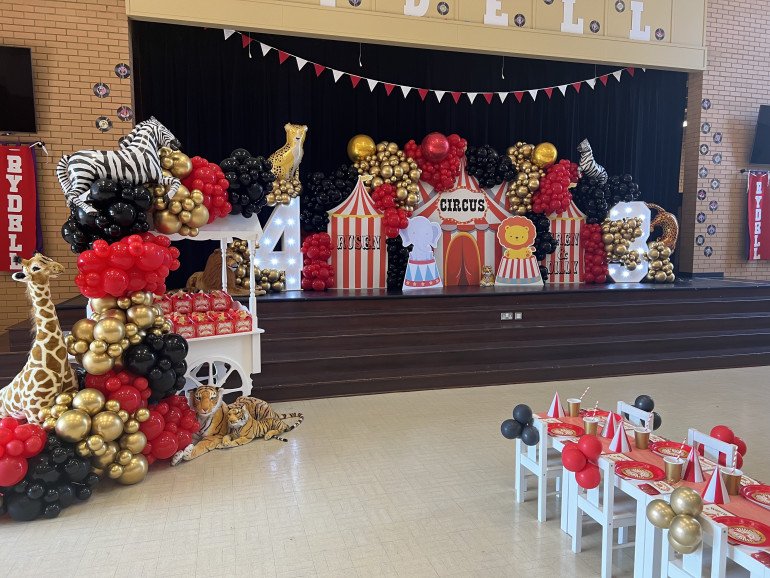 Circus themed bespoke balloon backdrop & Sweet cart with balloon garland