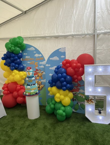 Custom backdrop for a super wings themed 5th birthday- Concept designed and set up by AvantEvents