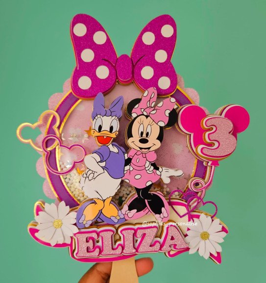 Minnie Mouse and Daisy Duck inspired cake topper.