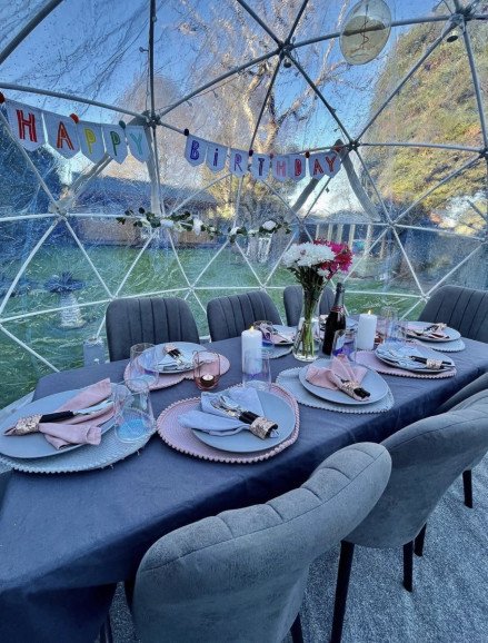 Group dining igloo for a birthday celebration.