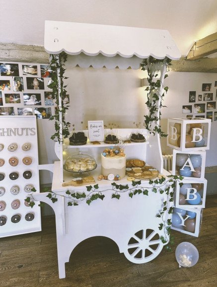 Our white sweet cart is available to hire bare or with sweet jars/tongs/bags and can come with accessories such as fairy lights, ivy, flower garlands or bunting.