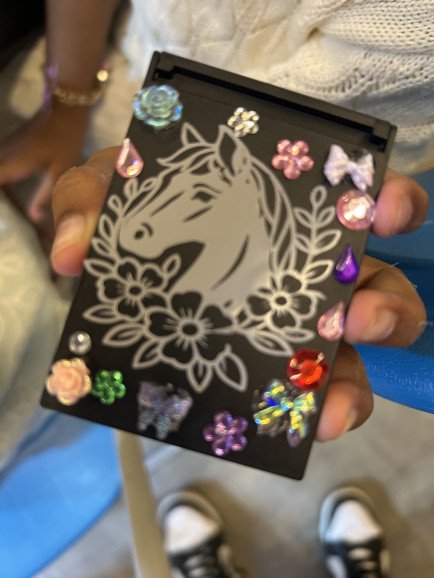 Vinyl horse diamonte mirrors, this an artwork of one of my students designing their mirror in my workshop.